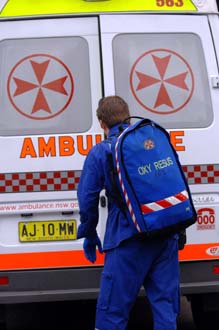 Paramedic at rear of Ambulance