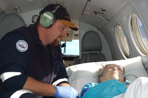 Patient being treated in plane